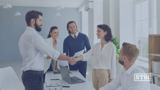 Business people shaking hands.